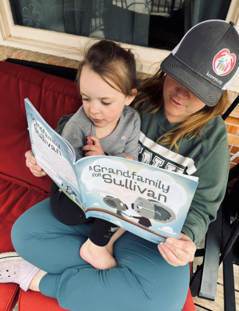 Kinship navigator Gabby reading a story to a child