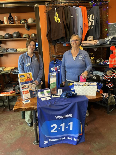 Jane and Nichole at tabling event in Laramie for 211 day 2026